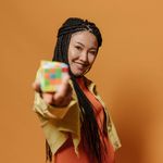Portrait of a smiling woman in her 40s.